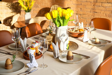 Festive setting on table served for Easter celebration