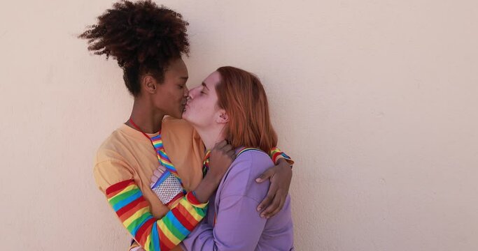 Happy lesbian couple having tender moment together 