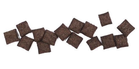 Cereal flakes in form of pillows, with vanilla flavor, pile isolated on white