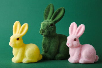 Cute Easter bunnies on green background