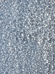 Snow ice texture. Thawed frost on a wooden board. wooden planks cowered with melting snow. Winter nature background of fluffy white snow