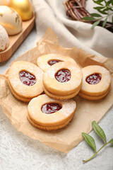 Delicious Easter cookies on light background