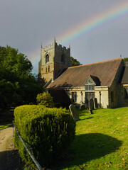 Rainbow over Beoley Church Worcestershire England UK. 12th. Century. St Leonard.