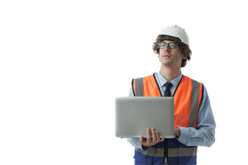 Young Caucasian civil engineer, construction worker wearing hard hat and safety uniform looking up thinking and holding laptop, isolated in white background, industrial occupation portrait concept.