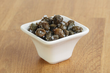 Salted marinated capers snack appetiser