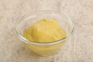 Organic mustard sauce in the bowl