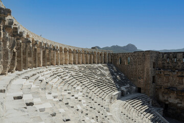 Ancient Roman amphitheater of Aspendos near Antalya. Historical destinations concept.