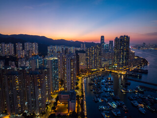 Drone fly over Hong Kong city sunset