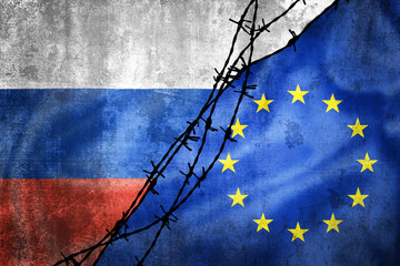 Grunge flags of Russia and European Union and Poland divided by barb wire illustration
