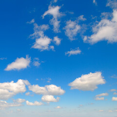 Naklejka na ściany i meble Blue sky with beautiful white clouds.