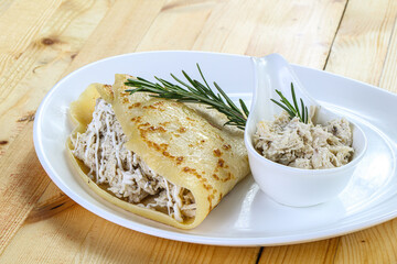 Pancake with chicken and sause