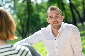 Couple with a dog in the park