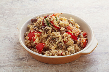 Arabic cous cous with meat and tomato