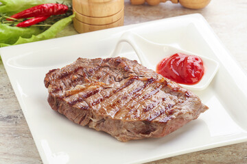 Grilled rib-eye steak beef meat