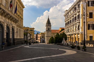 Fototapeta na wymiar the historic center of Benevento. On the left is the government building, while at the bottom you can see the bell tower that decorates the square