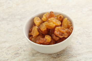 Sweet yellow raisin in the bowl