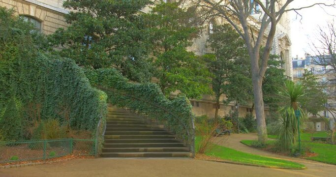Outdoor Stairs Covered With Overgrown Vines In The Old Building Of Ecole Polytechnique, 5th Arrondissement, Paris, France. - Pan Right Shot