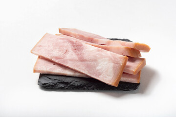 Smoked ham on a white background for insulation. meat appetizer