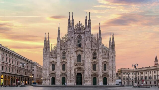 Milan Italy time lapse 4K, city skyline sunrise timelapse at Milano Duomo Cathedral