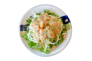 Die cut of fresh salmon salad on white isolated