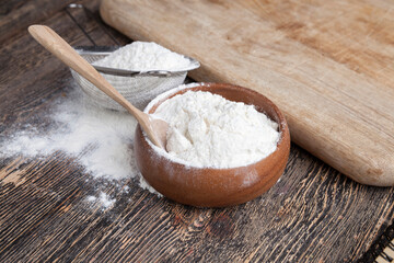 wheat flour in a wooden bowl