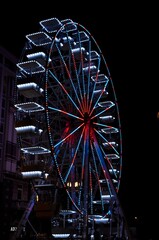 Lighting Ferris wheel at night in  amusement Park, Rijeka, Croatia.Ferris wheel in an amusement park at night time