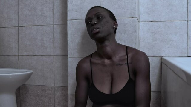 stress, depression - motionless black woman devoid of physical and mental energy