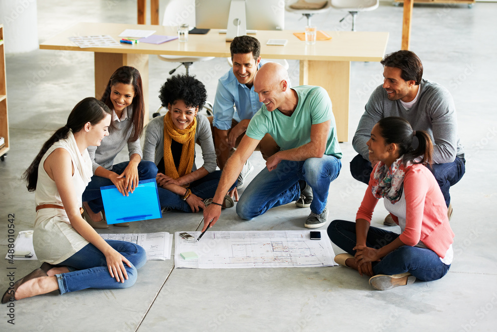 Poster theres no better work than teamwork. shot of a group of casually dressed businesspeople in the offic