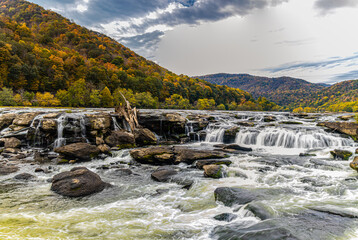 Fototapeta na wymiar Sandstone Falls With Fall Color, New River Gorge National Park, West Virginia, USA