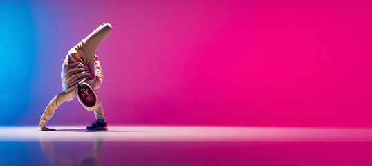 Flyer with young flexible sportive man dancing breakdance in white outfit on gradient pink blue...