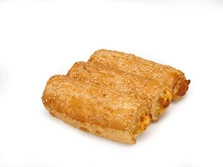 Puff on a white background. Rollini with cheese and spinach