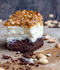 creamy chocolate cake with caramel and roasted peanuts