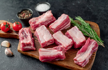 sliced ​​pork ribs on a stone background