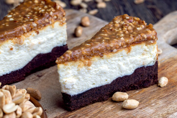 creamy chocolate cake with caramel and roasted peanuts