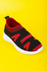 Beautiful sneakers on a plain background