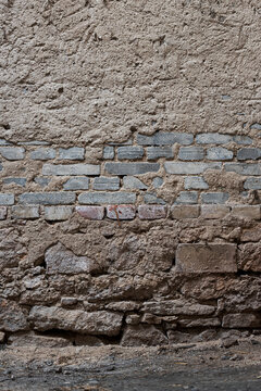 Wall background. Vintage stonewall texture. Aged bricks wall.