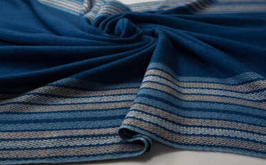 Close up of texture of hand woven stripe shawl, Thai cotton indigo dyed
