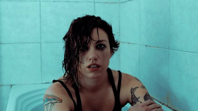 guilt, remorse - girl dressed in the bathtub obsessed with guilt