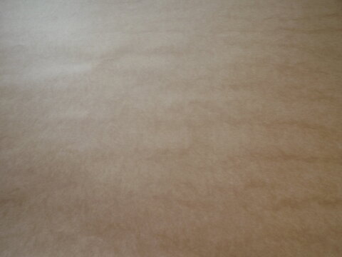 Brown gray surface with cardboard structure as background. High quality photo