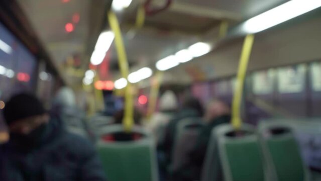 Interior of public transport bus, defocusing, blurr. Selective focus