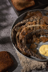 Lamprey in black tea jelly with mustard traditional Latvian cousins  
