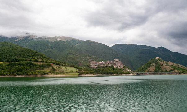 Landscape of Castel di TOra and Borgo Monte Antuni on Lake Turano, Lazio, Italy, during a cloudy day