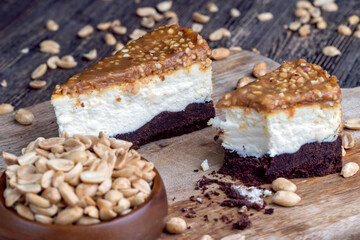 creamy chocolate cake with caramel and roasted peanuts