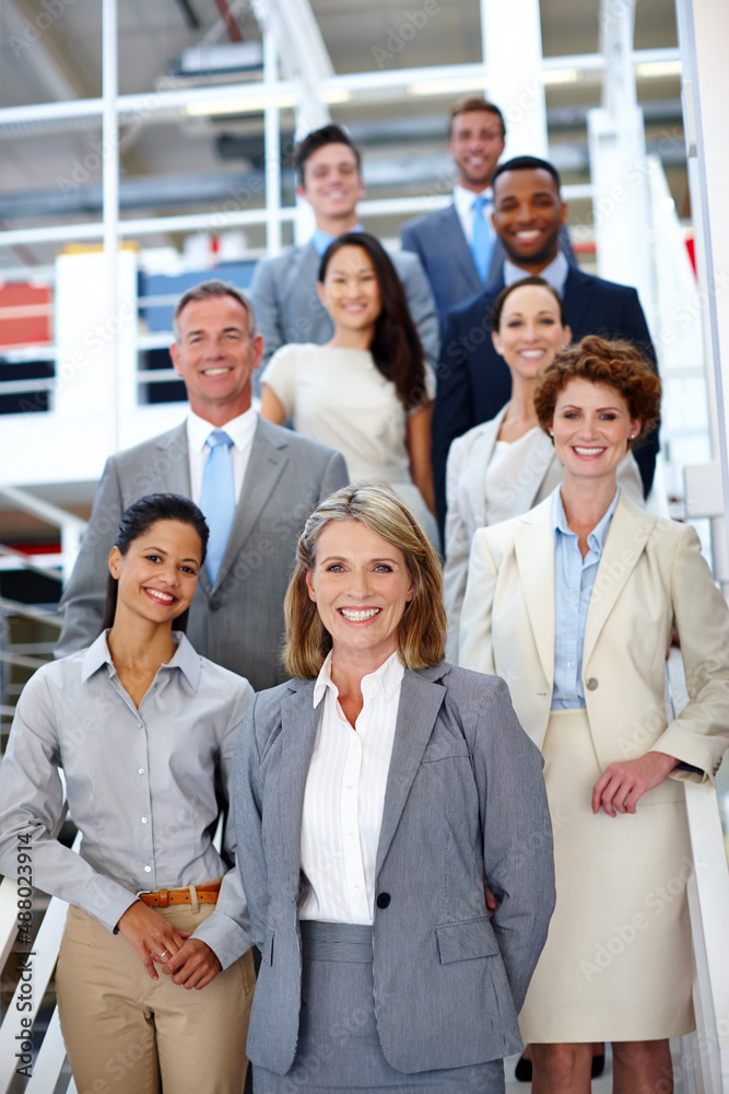 Wall mural She leads the way. Portrait of a diverse group of businesspeople in the office.