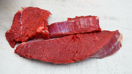 raw meat on the cutting table