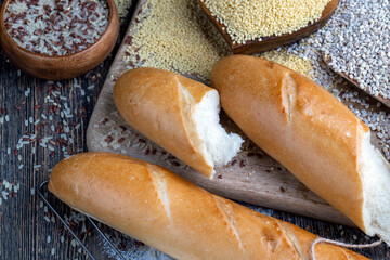 pieces of wheat baguette on a cutting board