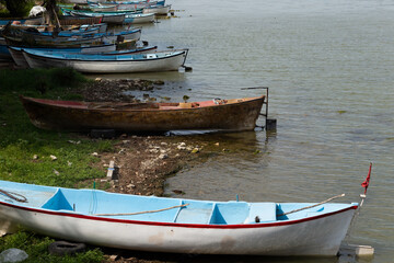 fishing boats by the lake