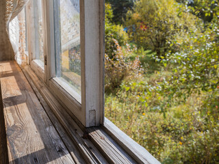 Old wooden window frame on the balcony