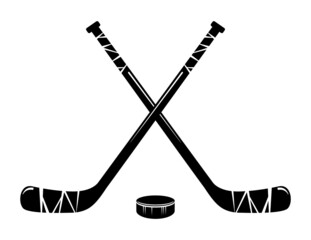 vector crossed hockey sticks and hockey puck
