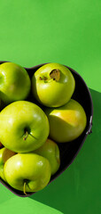 Green apples in a baking dish. Taste. Juiciness. Harvest. Copy space for text.